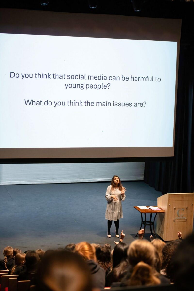Tulip discussing social media with students